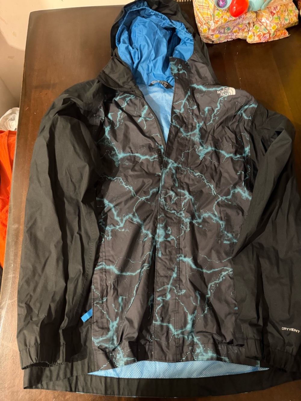 The North Face Black Jacket with Blue Lightning Print